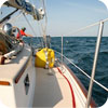 Deck of a sail boat at sea on a yacht delivery